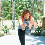 woman holding Yoga pose at soulful motion studio fort pierce