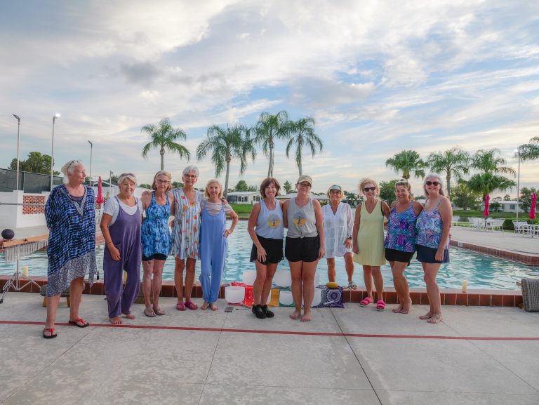 Group of women by the pool.