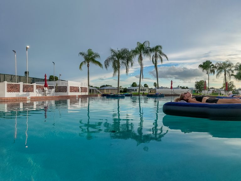 Person relaxing on pool float